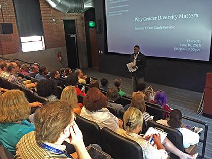 Paul James of Duke's Office of Institutional Equity speaks to employees from the University and Health System about the benefits of diversity during the first Diversify IT seminar June 18.
