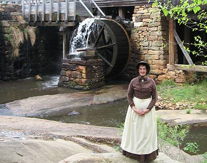 Margaret Lillard volunteers her time outside of work helping to run Yates Mill Associates, the nonprofit that restored and now maintains and operates historic Yates Mill, a circa-1756 gristmill just south of Raleigh. Photo courtesy of Margaret Lillard. 