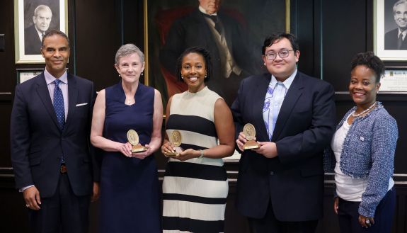 Provost Alec D. Gallimore with Sullivan Award winners Colleen Scott, Adrienne Jones and Elaijah Lapay. On right is Domonique Redmond