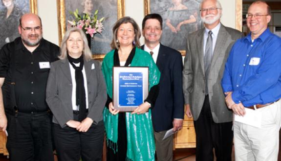 The Arts & Sciences Course Renumbering Team, led by Dr. Ingeborg Walther (holding plaque) received the 2011 Teamwork Award for a two-year project to standardize numbers for more than 8,000 courses. Photo by Duke University Photography.